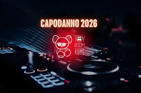 Consolle del Toy Room con l’insegna al neon del club